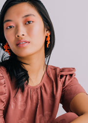 Woll Earrings: Coral-ESSE Purse Museum & Store